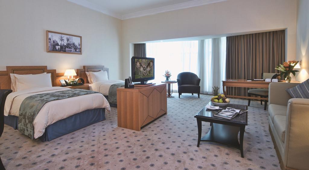 Wiseman Grand Hotel Doha Kültér fotó A room at the hotel