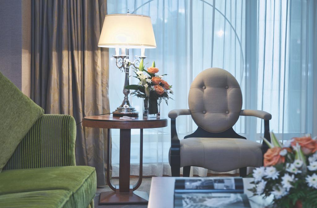 Wiseman Grand Hotel Doha Kültér fotó A living room at the hotel