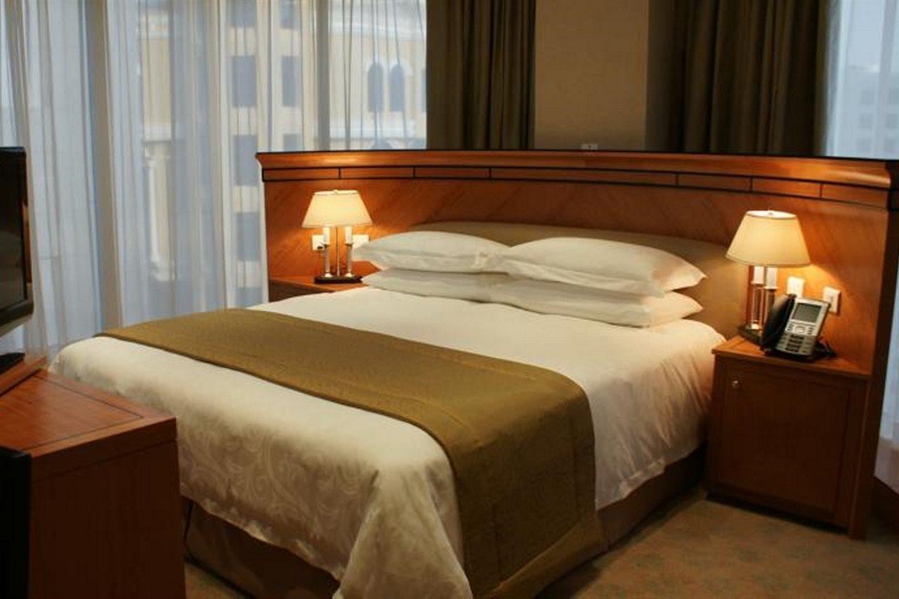 Wiseman Grand Hotel Doha Kültér fotó A bed