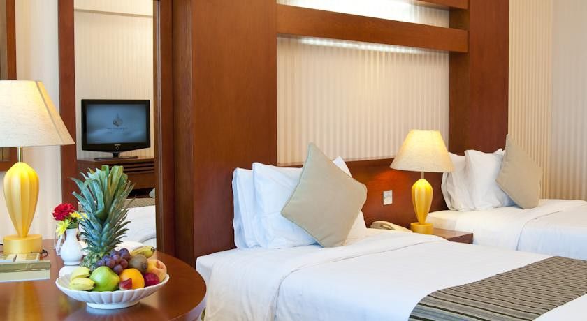 Wiseman Grand Hotel Doha Kültér fotó A room at the hotel