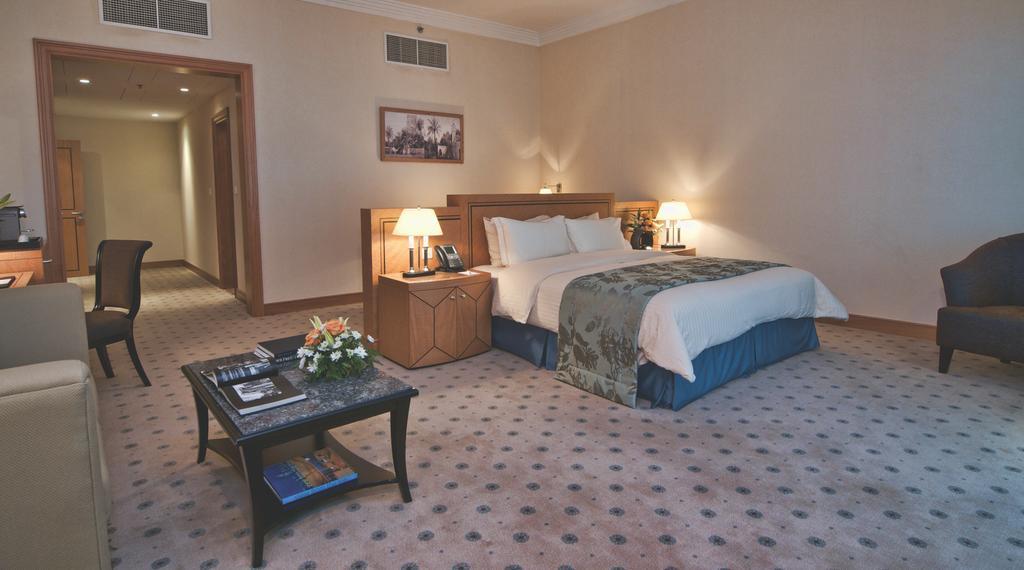Wiseman Grand Hotel Doha Kültér fotó A bedroom at the Grand Hyatt Hotel, Amman, Jordan